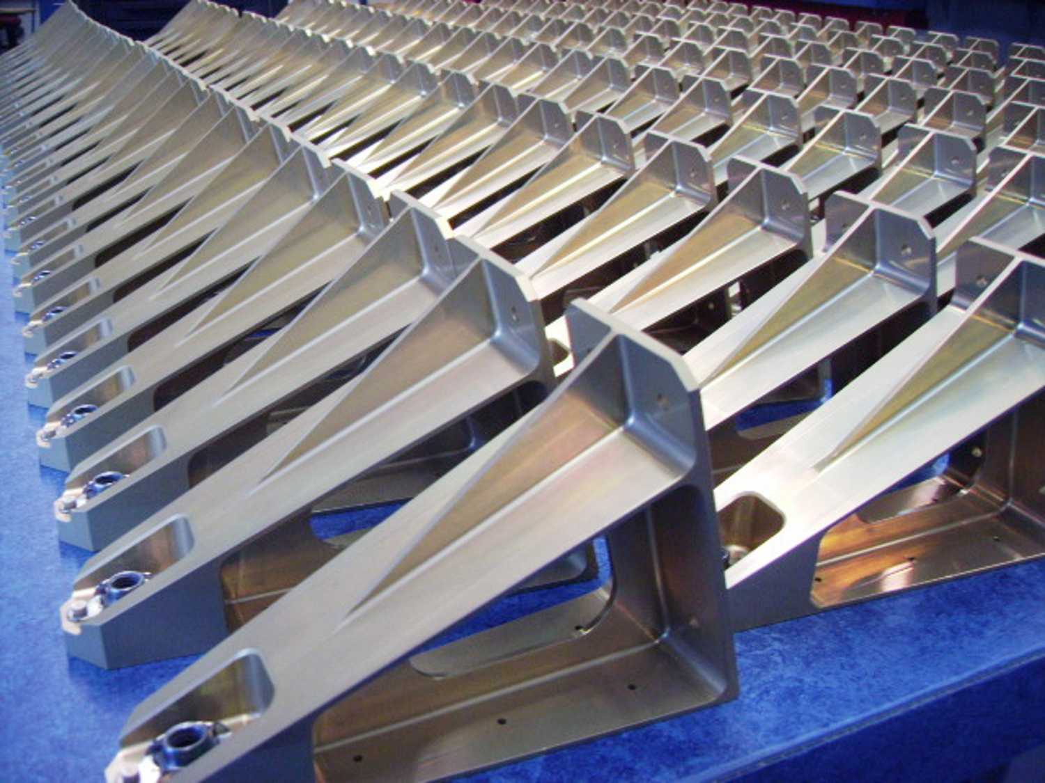 Series-produced base-brackets for the VEGA launch vehicle of ESA (European Space Agency).